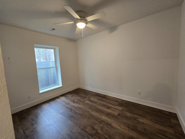24136 Lazy Daze Ln, Wheatland, MO 65779 - spare room with dark wood finished floors and ceiling fan