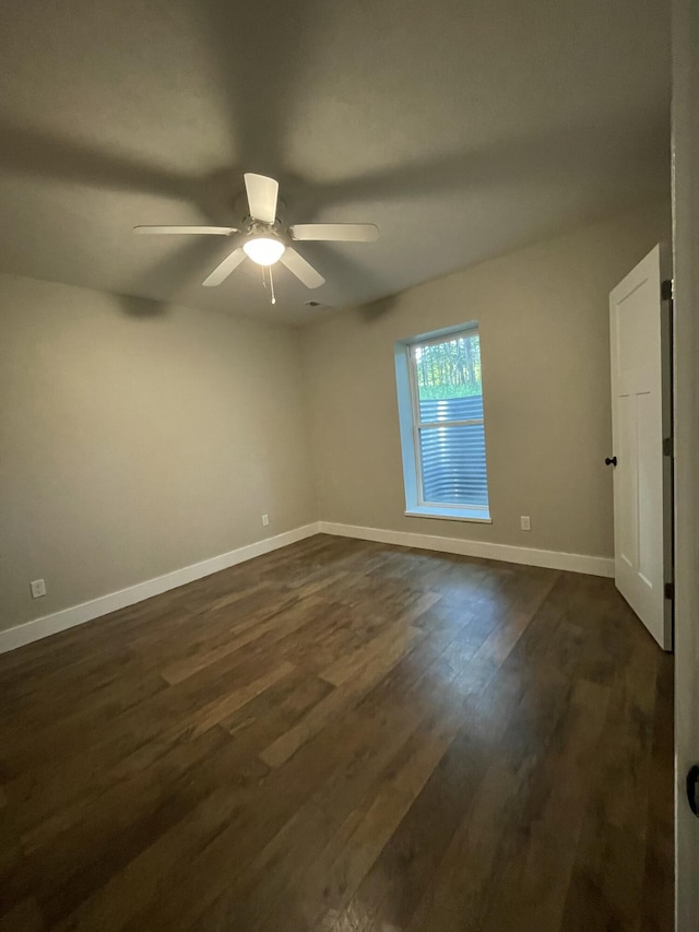 24136 Lazy Daze Ln, Wheatland, MO 65779 - unfurnished room with ceiling fan and dark wood-style flooring