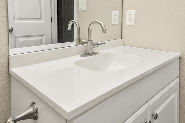 3539 S Walnut Hill Dr, Springfield, MO 65807 - bathroom view of vanity and a textured wall