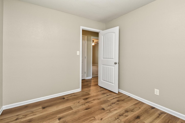 3539 S Walnut Hill Dr, Springfield, MO 65807 - spare room with wood finished floors