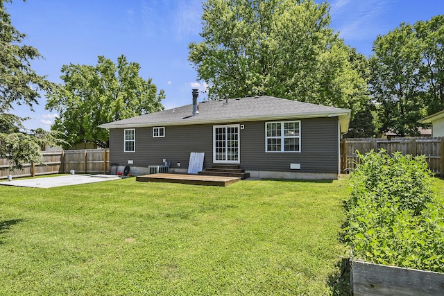 3539 S Walnut Hill Dr, Springfield, MO 65807 - back of house with a patio, a fenced backyard, a wooden deck, and roof with shingles