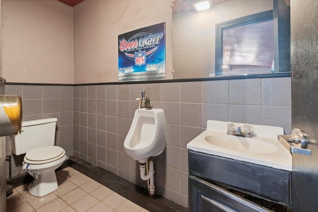 3493 US Highway 160, West Plains, MO 65775 - bathroom featuring tile walls, tile patterned floors, wainscoting, and vanity