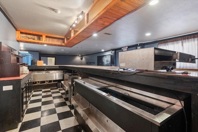 3493 US Highway 160, West Plains, MO 65775 - kitchen featuring tile patterned floors and a textured ceiling
