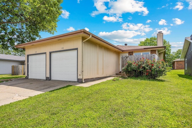 1016 S Lexington Ave, Springfield, MO 65802 - single story home with a garage, a front yard, and a chimney