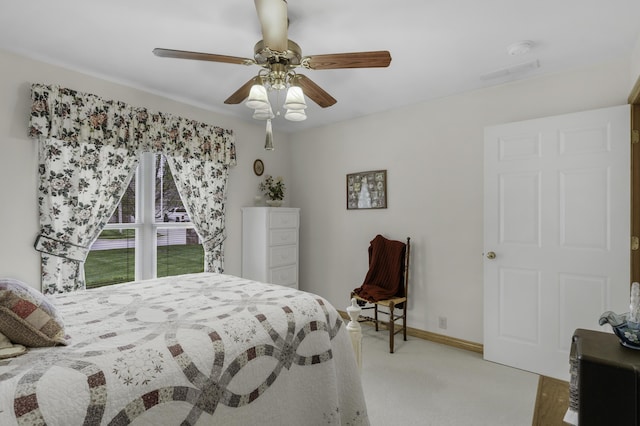 3416 S Barnes Ave, Springfield, MO 65804 - bedroom featuring light carpet and ceiling fan