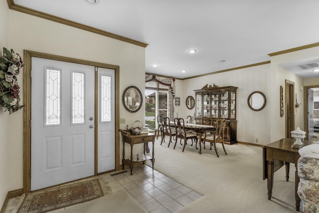 3416 S Barnes Ave, Springfield, MO 65804 - foyer with crown molding, light colored carpet, recessed lighting, and light tile patterned floors