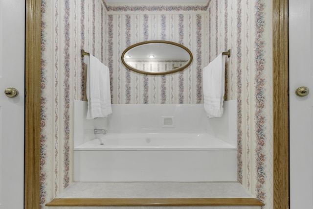 3416 S Barnes Ave, Springfield, MO 65804 - bathroom with wallpapered walls and a tub