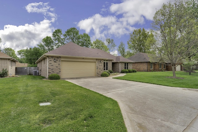 3416 S Barnes Ave, Springfield, MO 65804 - ranch-style house featuring brick siding, an attached garage, and driveway