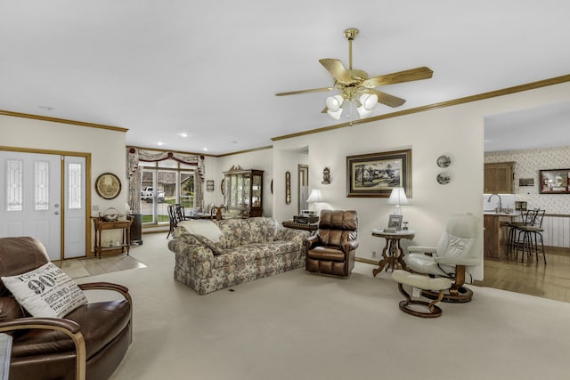 3416 S Barnes Ave, Springfield, MO 65804 - living area with crown molding, a ceiling fan, recessed lighting, carpet flooring, and wallpapered walls