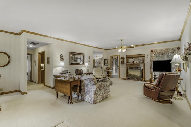 3416 S Barnes Ave, Springfield, MO 65804 - living room with light carpet, ceiling fan, and ornamental molding
