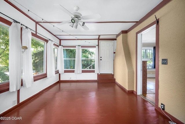 802 Hampton Pl, Joplin, MO 64801 - unfurnished sunroom featuring wood finished floors and a textured wall