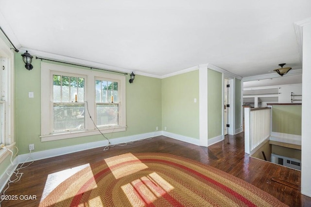 802 Hampton Pl, Joplin, MO 64801 - unfurnished living room with wood finished floors and ornamental molding
