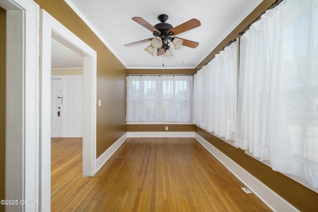 802 Hampton Pl, Joplin, MO 64801 - spare room featuring ornamental molding, hardwood / wood-style flooring, and a ceiling fan