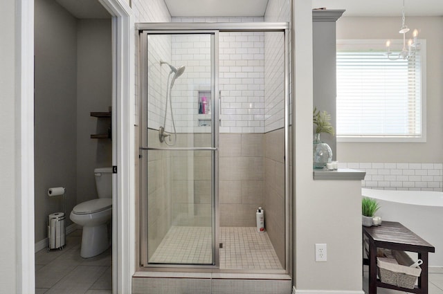 914 W Lorenza Dr, Nixa, MO 65714 - bathroom with a shower stall, tile patterned flooring, and a chandelier