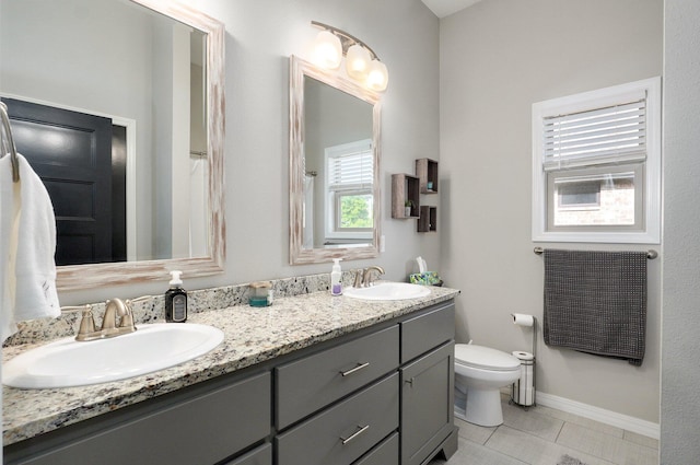 914 W Lorenza Dr, Nixa, MO 65714 - bathroom with double vanity and tile patterned floors