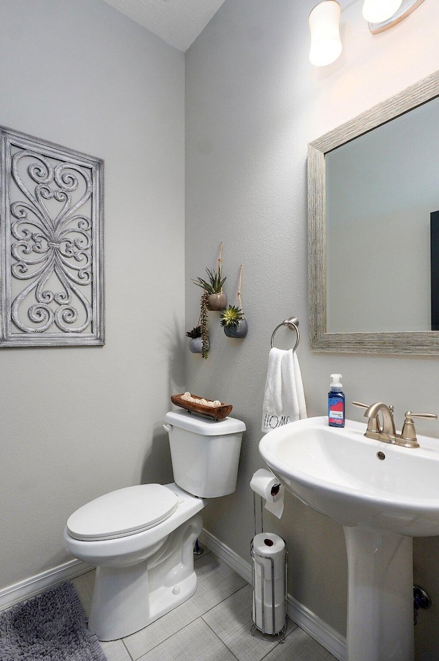 914 W Lorenza Dr, Nixa, MO 65714 - half bathroom with toilet and baseboards