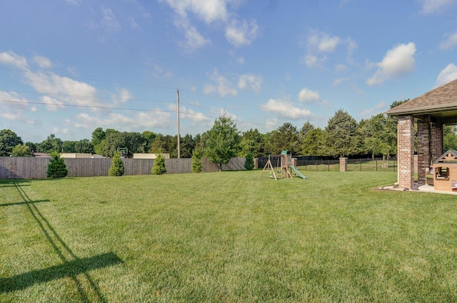 914 W Lorenza Dr, Nixa, MO 65714 - fenced backyard with a playground