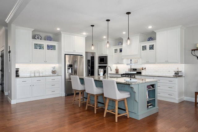 914 W Lorenza Dr, Nixa, MO 65714 - kitchen with appliances with stainless steel finishes, backsplash, white cabinets, dark wood-style flooring, and recessed lighting