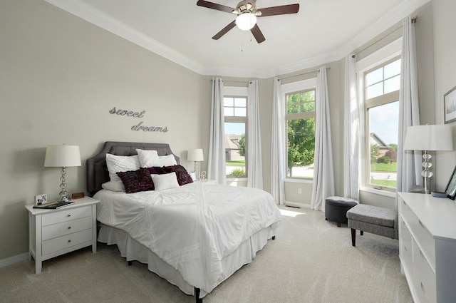 914 W Lorenza Dr, Nixa, MO 65714 - bedroom featuring light carpet, multiple windows, crown molding, and ceiling fan