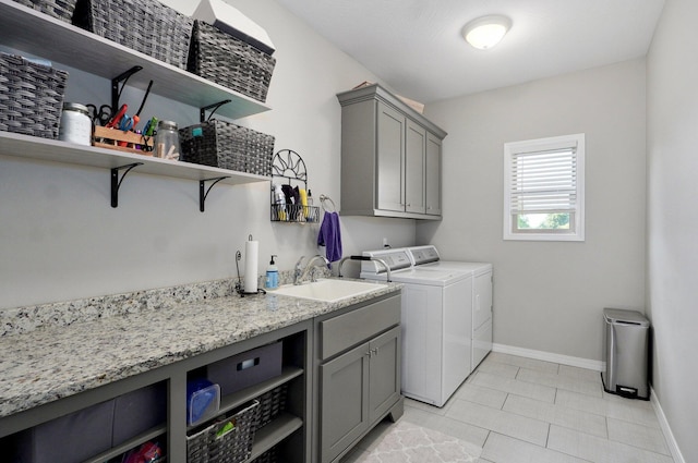 914 W Lorenza Dr, Nixa, MO 65714 - laundry room with separate washer and dryer, cabinet space, and light tile patterned flooring