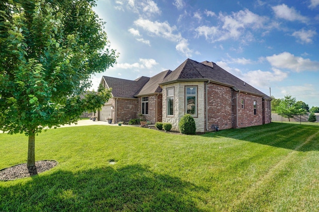 914 W Lorenza Dr, Nixa, MO 65714 - view of front of home featuring brick siding, a garage, a shingled roof, and concrete driveway