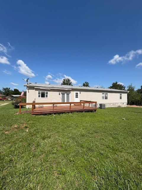 64 Inman Dr, Theodosia, MO 65761 - back of property with a deck and a yard