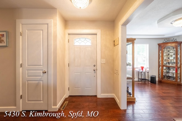 5430 S Kimbrough Ave, Springfield, MO 65810 - entrance foyer featuring dark wood finished floors and baseboards
