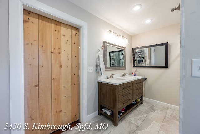 5430 S Kimbrough Ave, Springfield, MO 65810 - bathroom with double vanity and recessed lighting