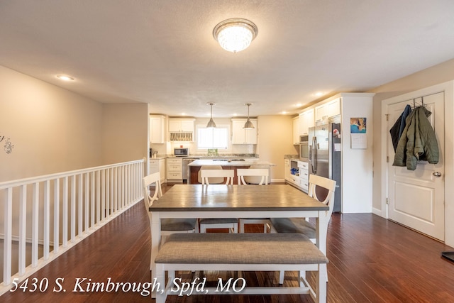 5430 S Kimbrough Ave, Springfield, MO 65810 - dining space with dark wood finished floors and recessed lighting
