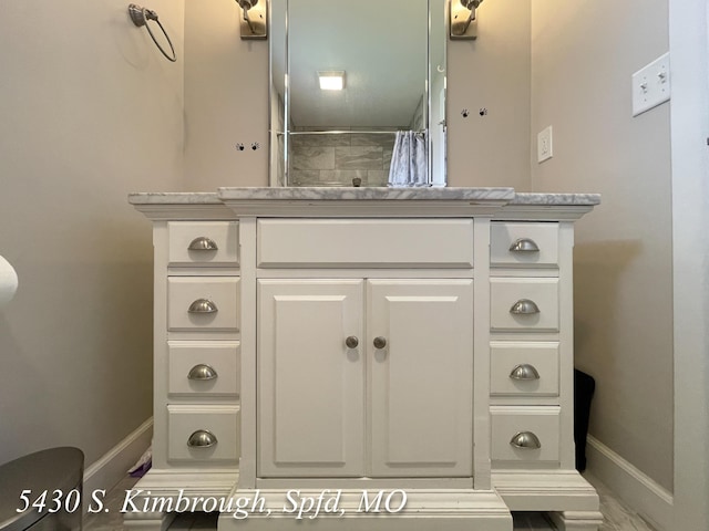 5430 S Kimbrough Ave, Springfield, MO 65810 - bathroom featuring vanity and curtained shower