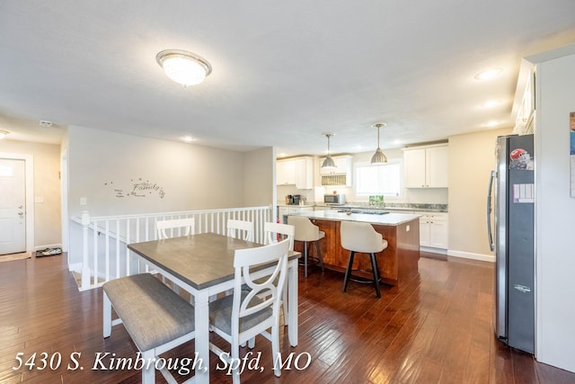 5430 S Kimbrough Ave, Springfield, MO 65810 - dining room with dark wood-type flooring and recessed lighting
