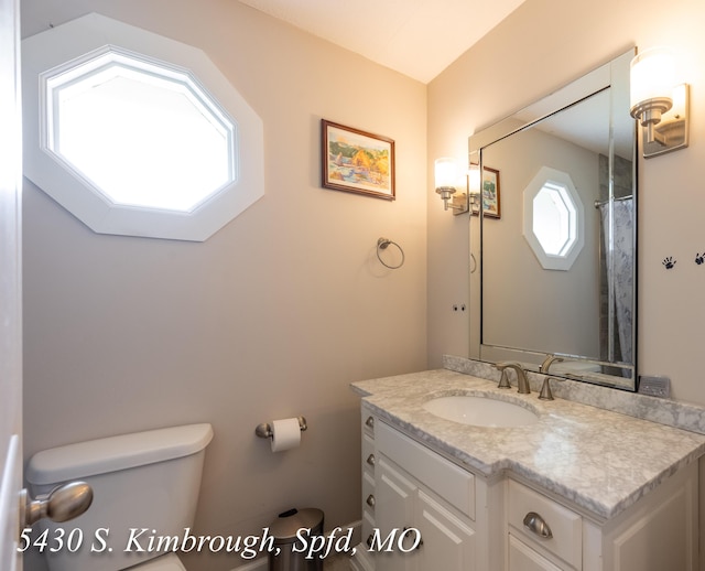 5430 S Kimbrough Ave, Springfield, MO 65810 - bathroom featuring toilet and vanity