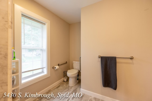 5430 S Kimbrough Ave, Springfield, MO 65810 - bathroom with toilet and baseboards