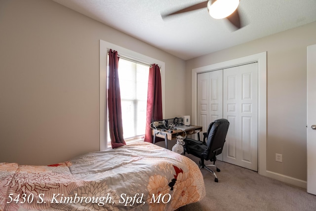 5430 S Kimbrough Ave, Springfield, MO 65810 - carpeted bedroom with a closet and a ceiling fan