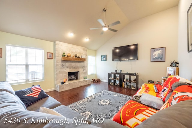 5430 S Kimbrough Ave, Springfield, MO 65810 - living area featuring ceiling fan, wood finished floors, a fireplace, and high vaulted ceiling