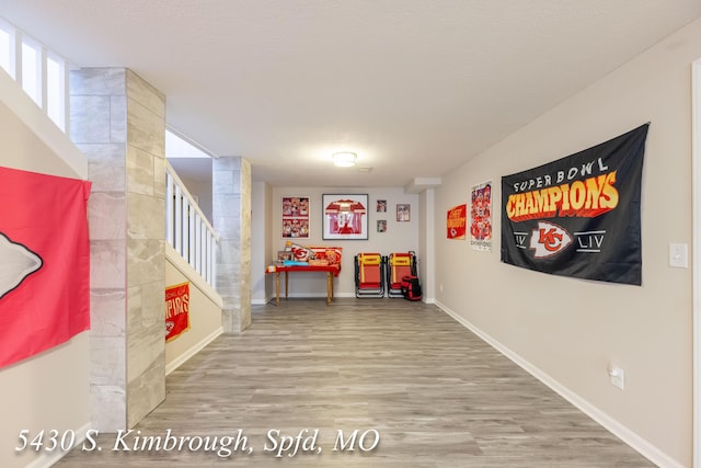 5430 S Kimbrough Ave, Springfield, MO 65810 - recreation room featuring wood finished floors and baseboards