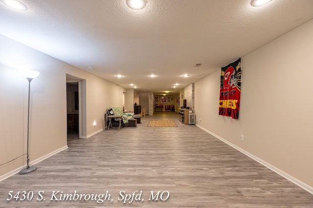 5430 S Kimbrough Ave, Springfield, MO 65810 - corridor featuring wood finished floors and a textured ceiling