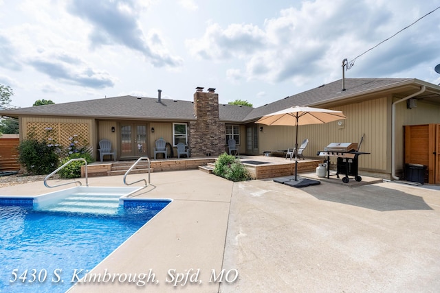 5430 S Kimbrough Ave, Springfield, MO 65810 - swimming pool featuring french doors, grilling area, and a patio