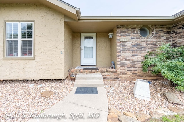 5430 S Kimbrough Ave, Springfield, MO 65810 - doorway to property featuring stucco siding