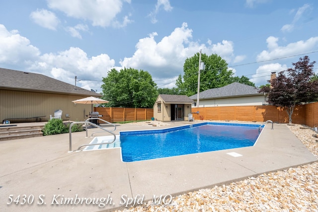 5430 S Kimbrough Ave, Springfield, MO 65810 - view of pool with a fenced backyard, a patio area, and a storage unit