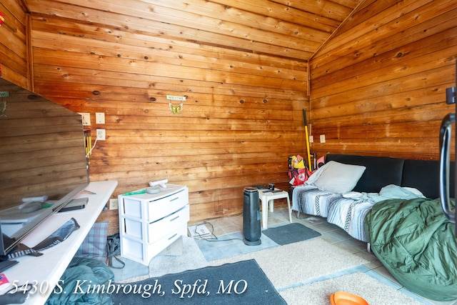 5430 S Kimbrough Ave, Springfield, MO 65810 - bedroom with vaulted ceiling, tile patterned floors, wooden walls, and wooden ceiling