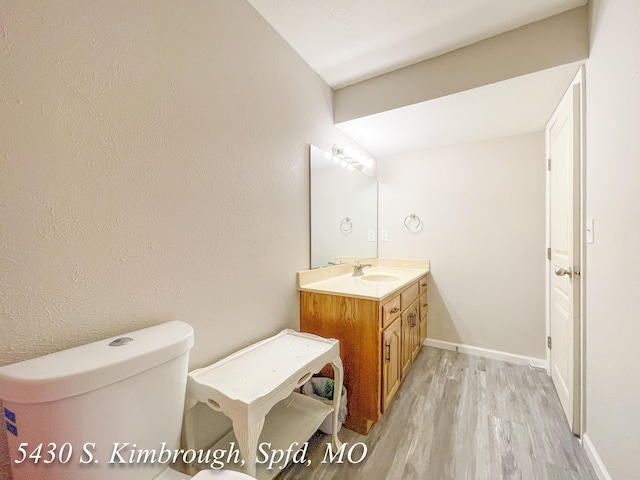 5430 S Kimbrough Ave, Springfield, MO 65810 - bathroom with vanity and wood finished floors