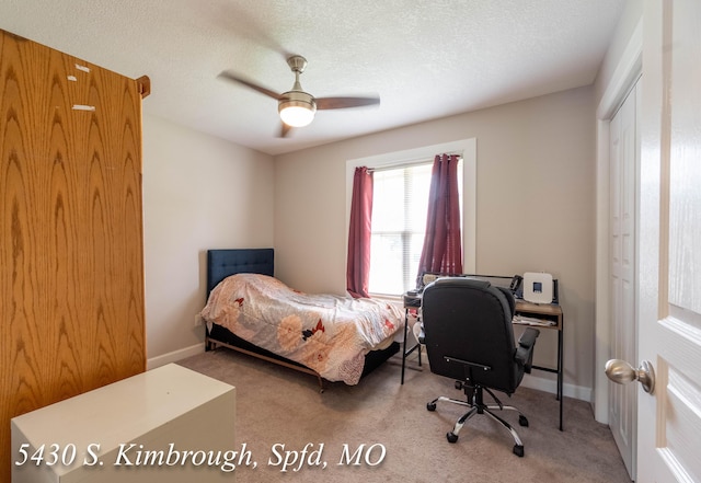 5430 S Kimbrough Ave, Springfield, MO 65810 - bedroom featuring carpet flooring, an office area, a ceiling fan, and a textured ceiling