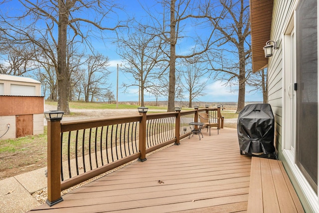 6585 N Farm Rd 61, Walnut Grove, MO 65770 - wooden deck with area for grilling