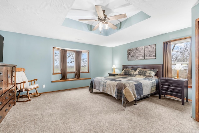 6585 N Farm Rd 61, Walnut Grove, MO 65770 - carpeted bedroom with a raised ceiling and ceiling fan
