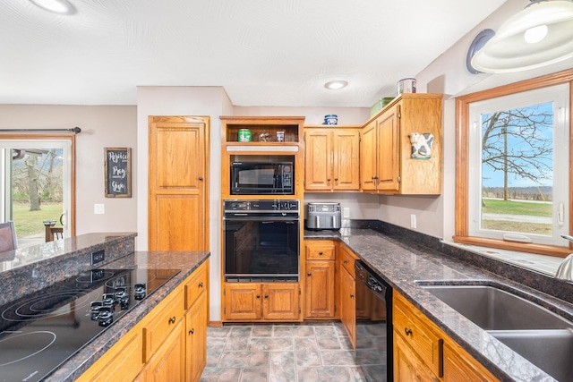 6585 N Farm Rd 61, Walnut Grove, MO 65770 - kitchen with black appliances, dark stone countertops, and light stone finish floors