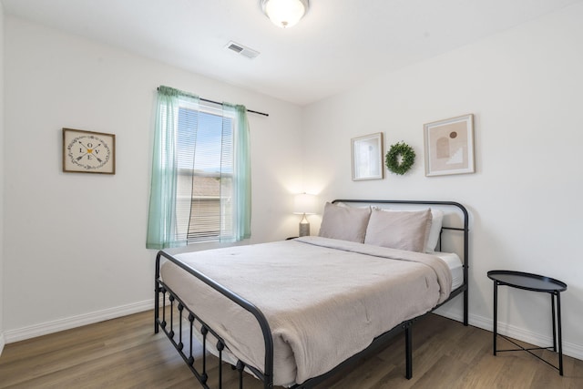 2950 Vineyards Pkwy Unit 5, Branson, MO 65616 - bedroom featuring baseboards and wood finished floors