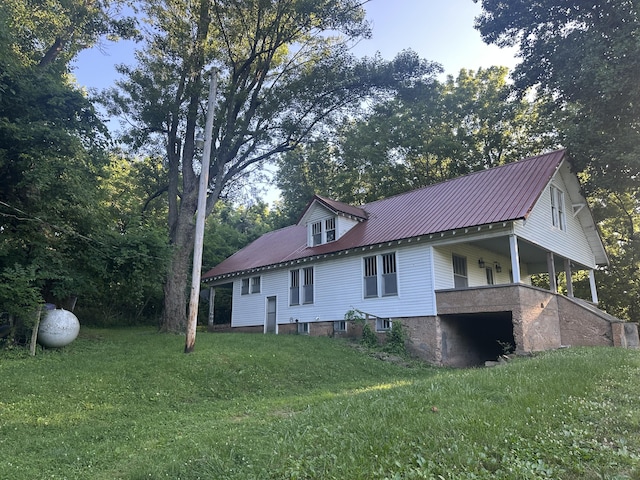 5143 Farm Rd Unit 2000, Pierce City, MO 65723 - back of property featuring a yard and a metal roof
