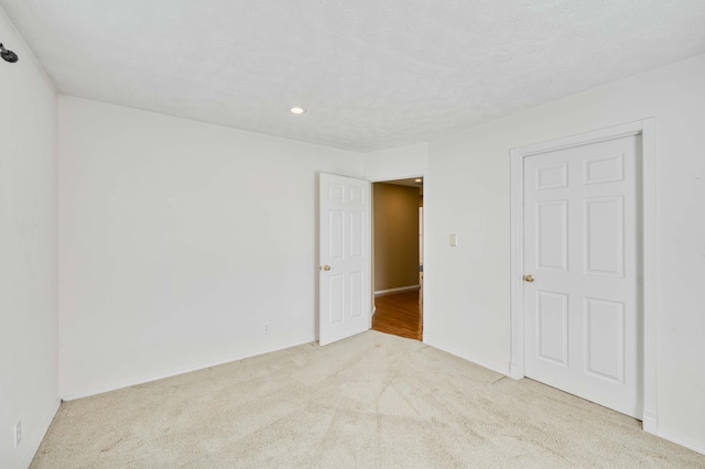 784 S 17th St, Ozark, MO 65721 - unfurnished bedroom with carpet flooring and recessed lighting