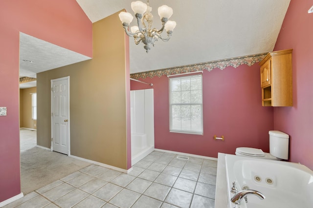 784 S 17th St, Ozark, MO 65721 - full bath featuring lofted ceiling, a chandelier, healthy amount of natural light, a jetted tub, and a stall shower